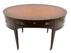 Georgian style mahogany and yew wood banded oval library writing table