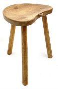 'Mouseman' oak three legged stool with dished kidney shaped seat