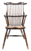 Unusual 19th century elm and beech high comb back Windsor armchair