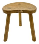 'Mouseman' oak three legged stool with dished kidney shaped seat