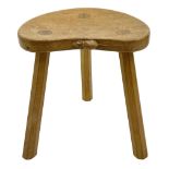 'Mouseman' oak three legged stool with dished kidney shaped seat