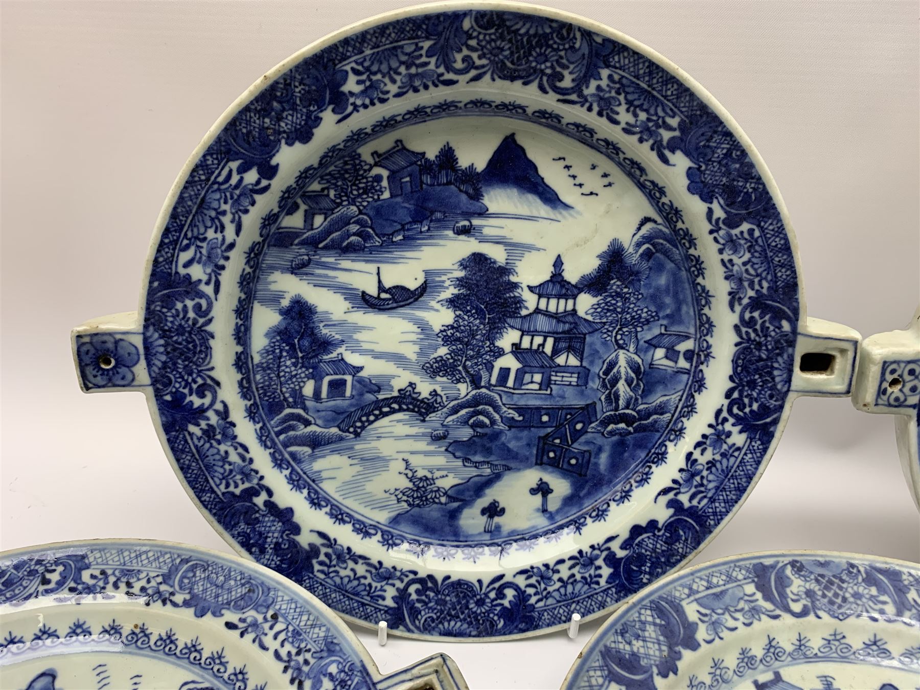 Set of seven late 18th/early 19th century Chinese export blue and white hot water plates - Image 10 of 11