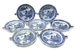 Set of seven late 18th/early 19th century Chinese export blue and white hot water plates