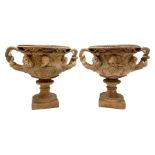 Pair of late 19th/early 20th century terracotta twin handled campagna urns or Warwick vases