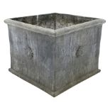 Lead jardinière planter of square form decorated with stylised flower heads motifs