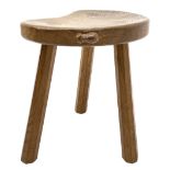 'Mouseman' oak three legged stool with dished kidney shaped seat