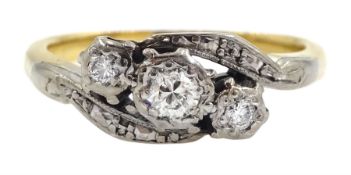 Gold three stone diamond ring