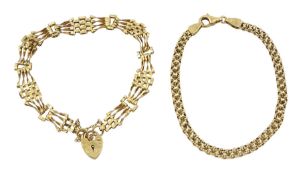 Gold double cable link bracelet and a gold gate bracelet