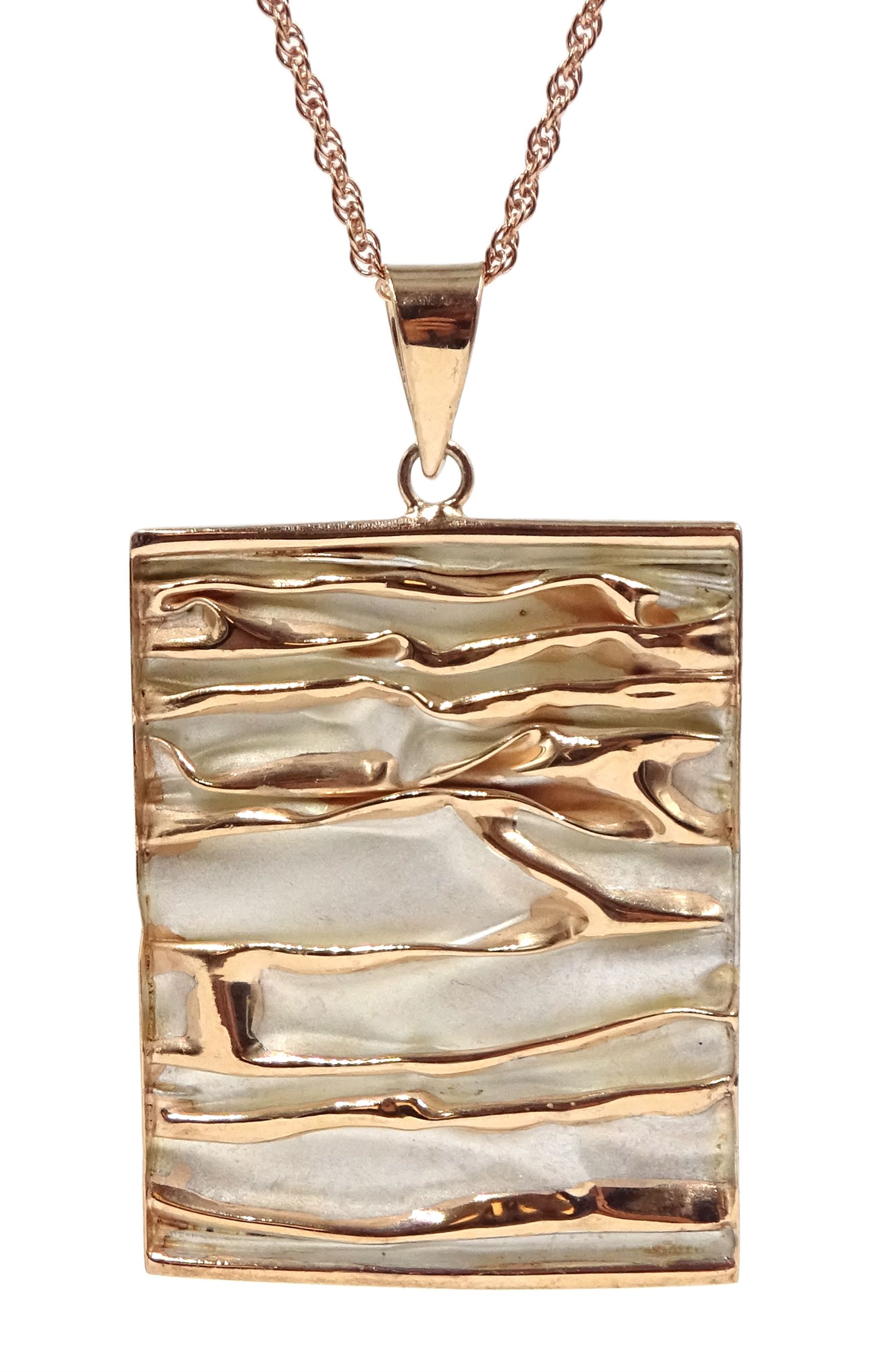 Rose gold on silver textured pendant necklace