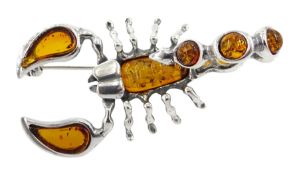 Silver amber scorpion brooch