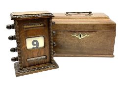 A small Victorian oak cased perpetual calendar with beaded and barley twist detail H16cm