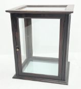 An early 20th century oak glazed counter top display case