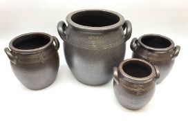 Set of four Swedish Hoganas cooking pots with twin handles
