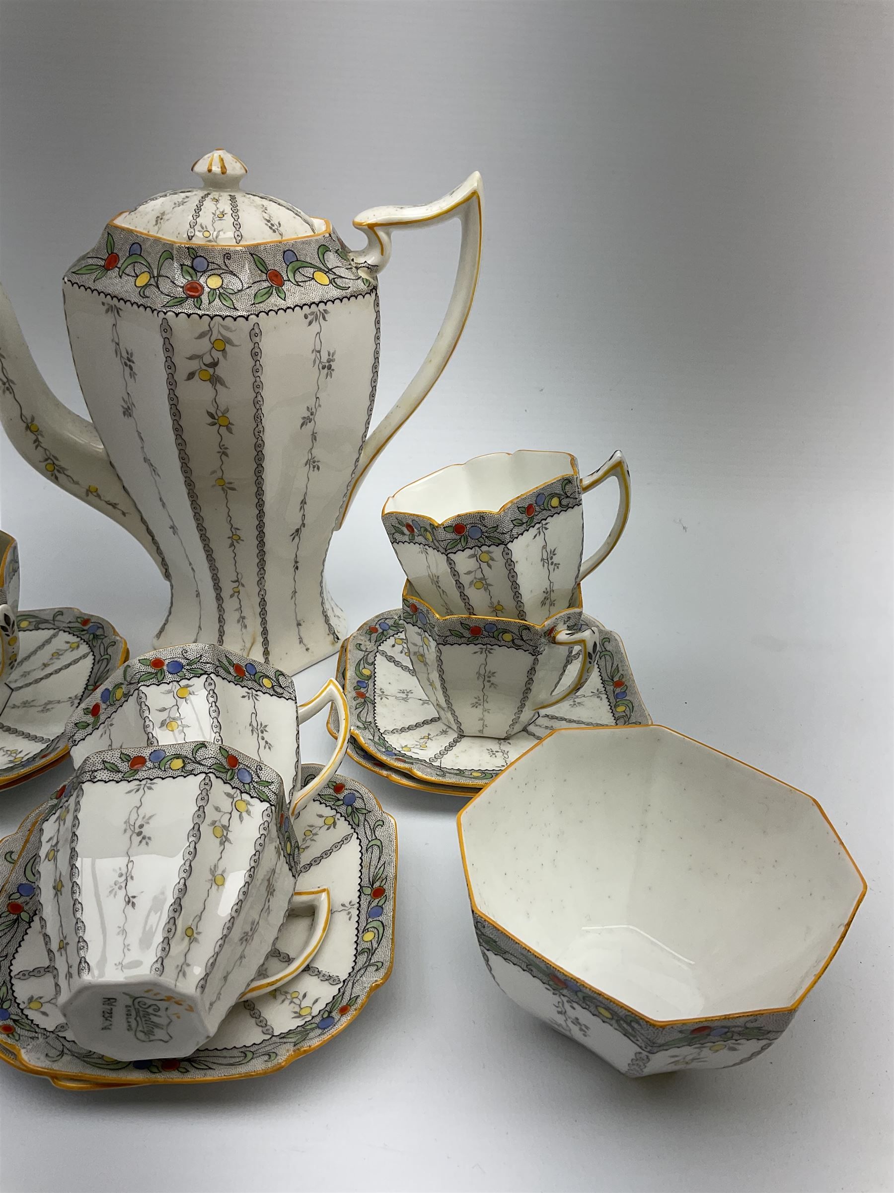 An Art Deco Shelley Queen Anne shape coffee set for six decorated in the Fruit Border pattern - Image 2 of 12