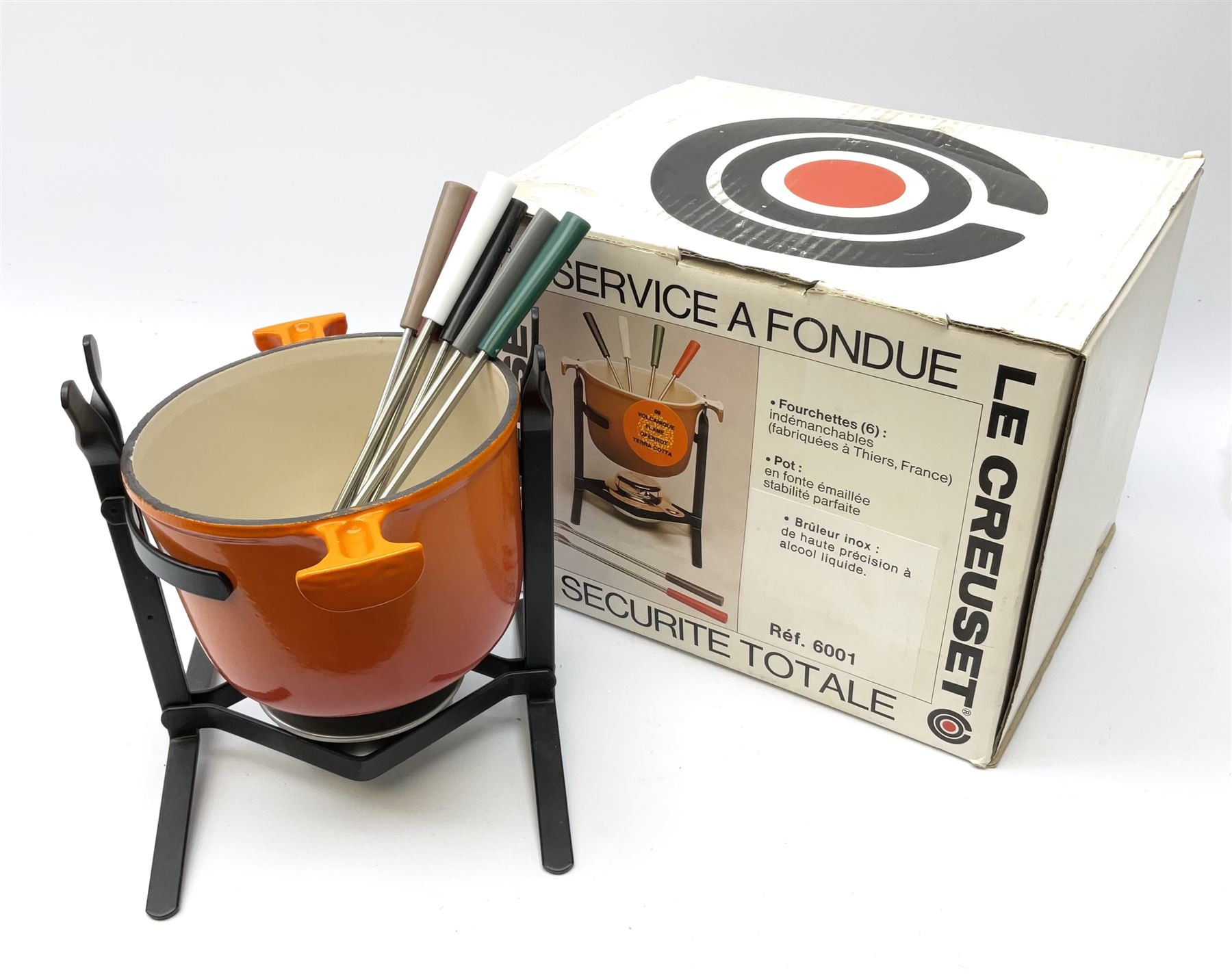 A boxed Le Cresuet fondue set.