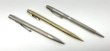 Two silver cased propelling pencils