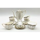 An Art Deco Shelley Queen Anne shape coffee set for six decorated in the Fruit Border pattern