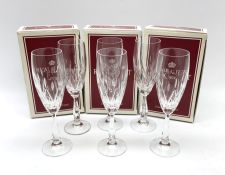 A boxed set of six Royal Albert Crystal Countess champagne flutes.