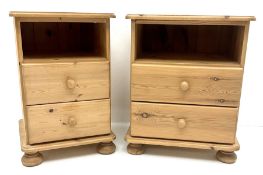 Two solid pine bedside cabinets
