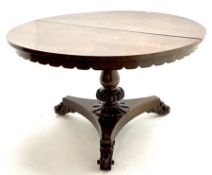 Early Victorian rosewood circular tilting dining table