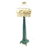 Arts & Crafts style green painted standard lamp