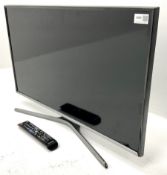 Samsung UE32J5500AK television with remote control