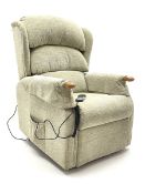 Electric rise and recline armchair upholstered in a light green fabric