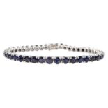 18ct white gold round sapphire line bracelet