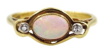 Gold opal and diamond three stone ring