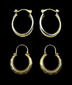 Pair of white and yellow gold hoop earrings and one other pair