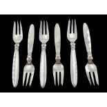 Set of six silver cake forks