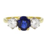 18ct gold three stone oval sapphire and round brilliant cut diamond ring