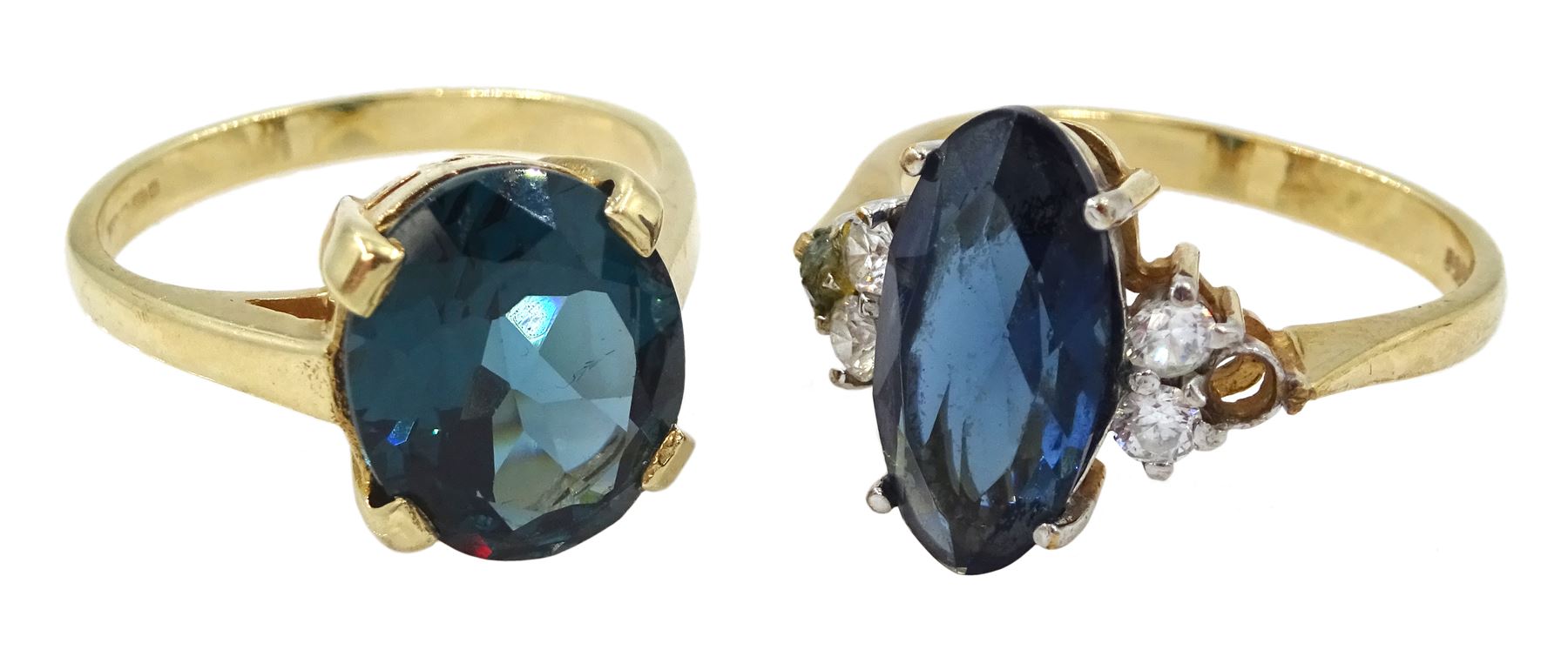 Gold single London blue topaz and one other gold stone set dress ring