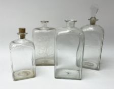 A group of four Georgian straight sided decanters