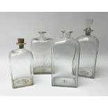 A group of four Georgian straight sided decanters