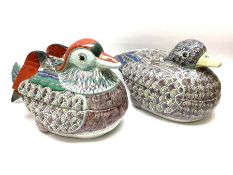 A pair of large Chinese lidded tureens modelled as a male and female duck