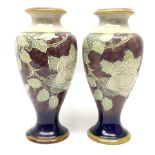 A pair of early 20th century Royal Doulton stoneware vases
