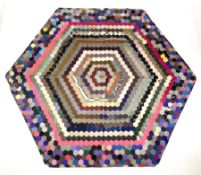 An early/mid 20th century hexagonal patchwork cover of hexagonal form