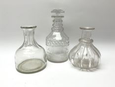 A 19th century cut glass decanter of mallet form with triple faceted ring neck and cut mushroom stop
