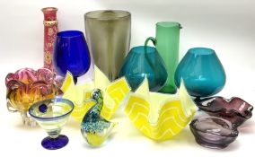 A group of coloured glassware