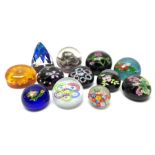 A group of paperweights