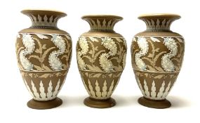 A set of three 19th century Doulton Lambeth silicon ware vases