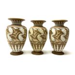 A set of three 19th century Doulton Lambeth silicon ware vases