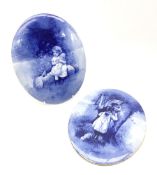 A pair of Royal Doulton blue and white plaques