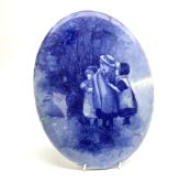 A Royal Doulton blue and white wall plaque