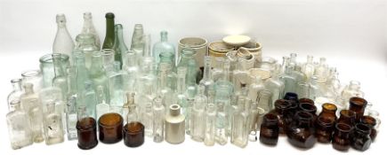 A collection of assorted glass bottles