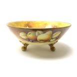 A Coalport bowl hand painted to the interior and exterior with fruit still life upon a mossy ground