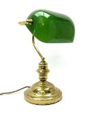 A Bankers desk lamp with green glass shade