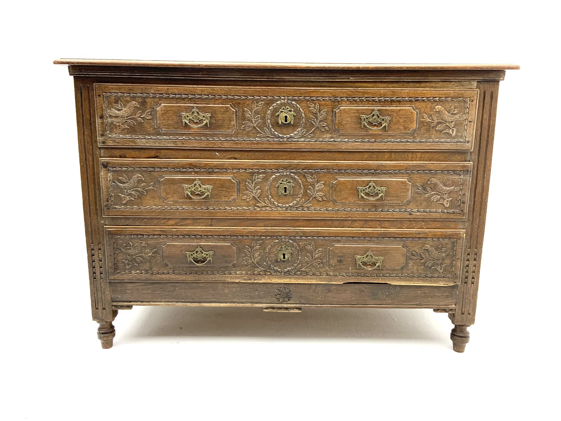 19th Century Continental carved oak three drawer chest