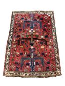 Persian red ground rug